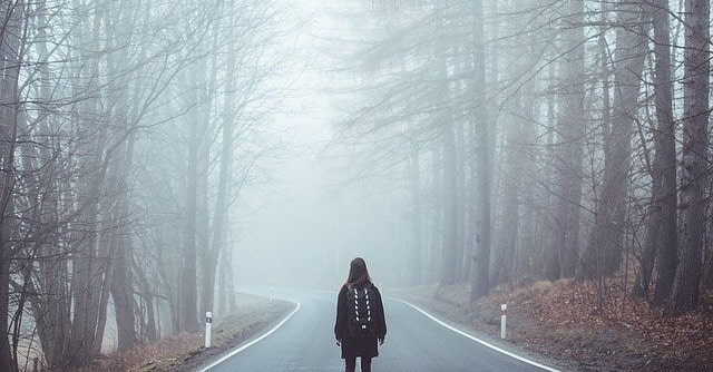 Person walking along a road
