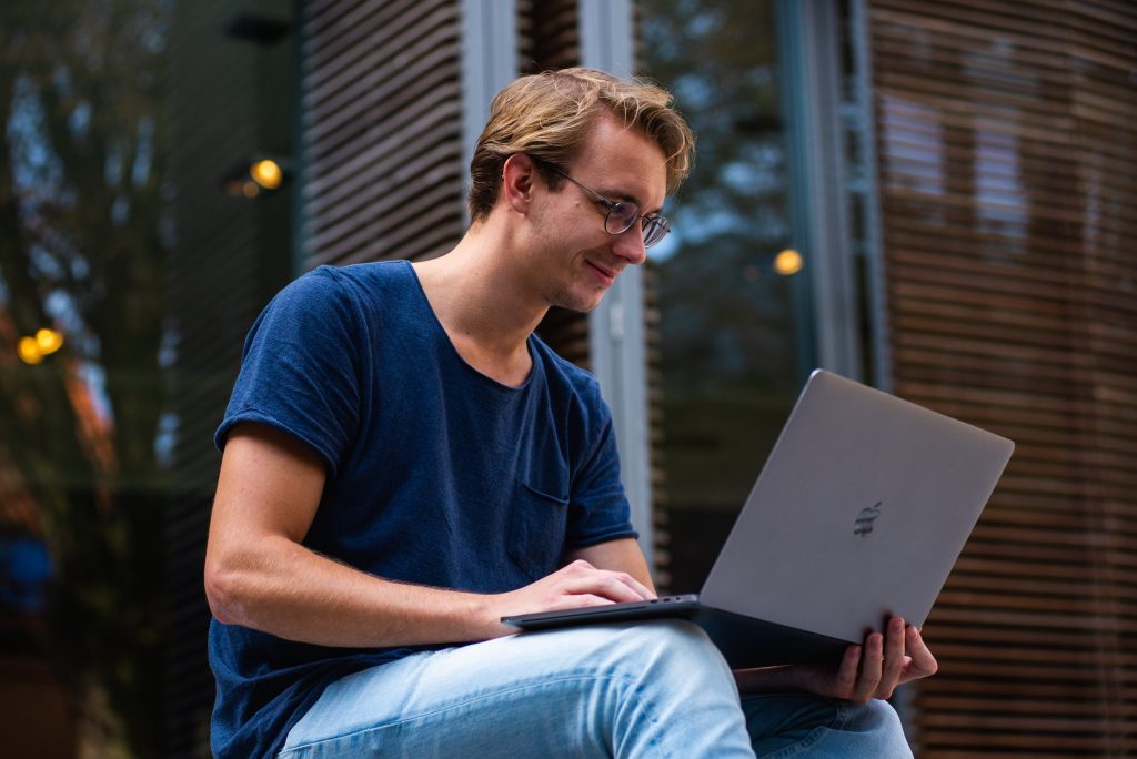 Man setting up business plan on laptop